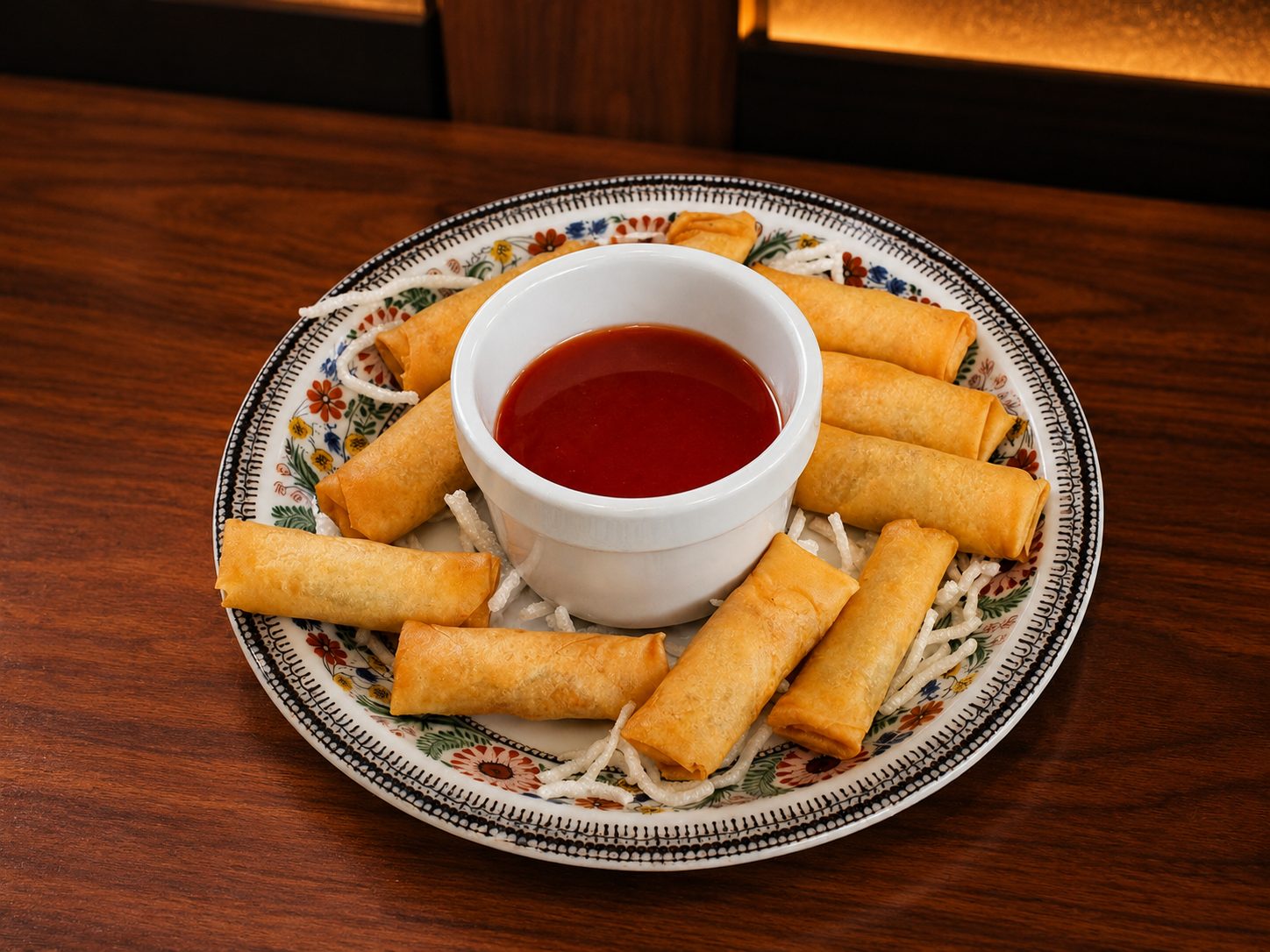 Small Chinese spring rolls with sweet-and-sour sauce