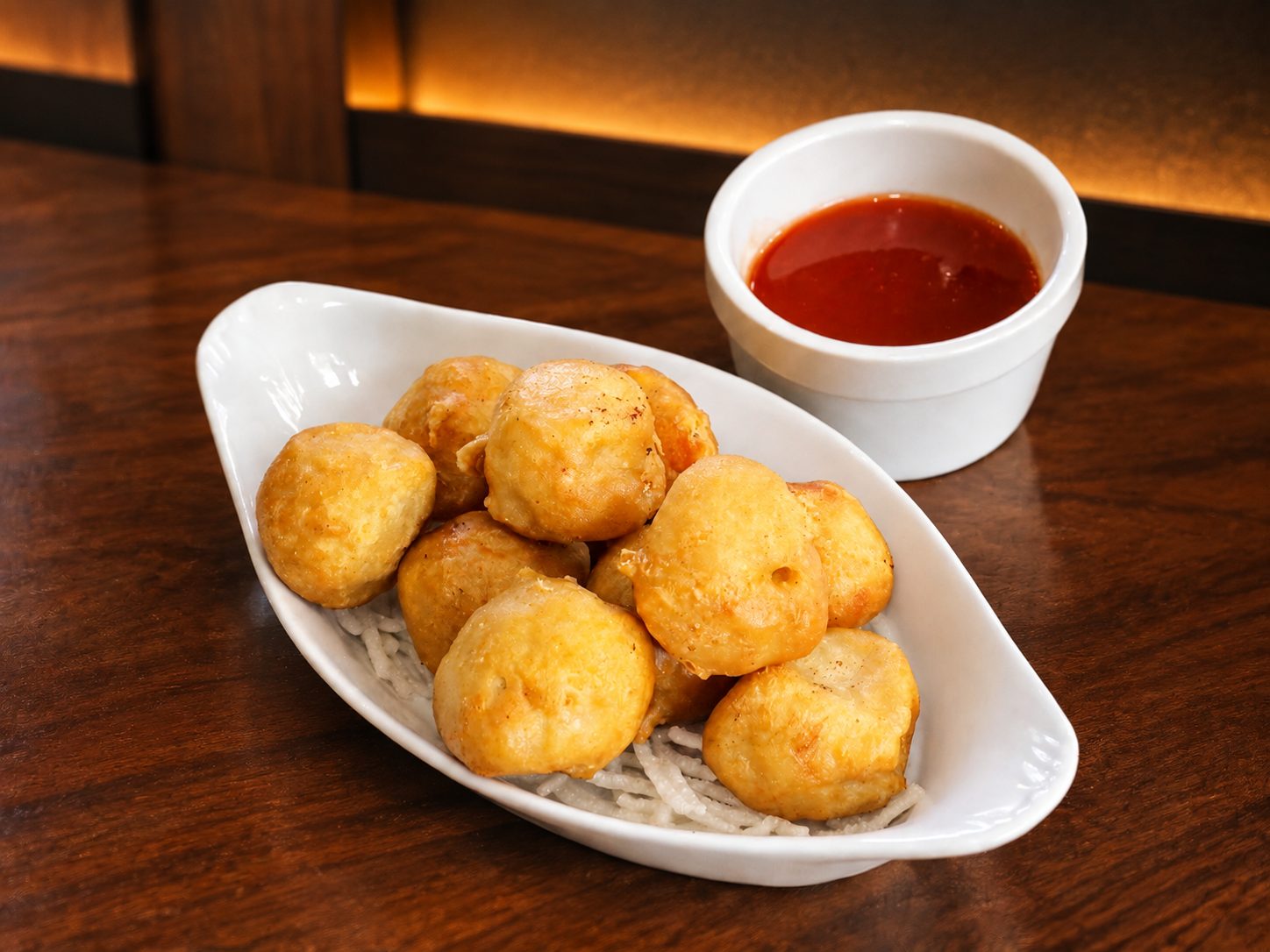 Koe Lo Kai — crispy chicken in sweet-and-sour sauce