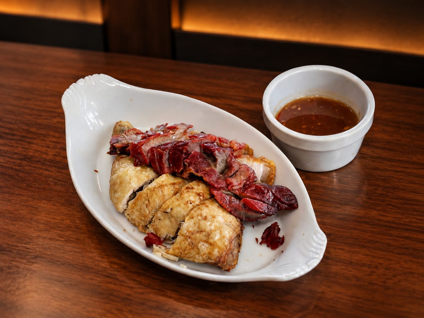 Moksie metie — mixed roasted meats with dipping sauce