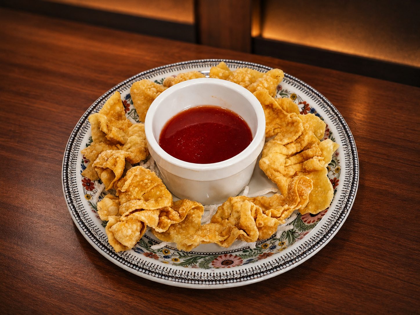 Pangsit goreng — fried chicken wontons with sweet-and-sour sauce